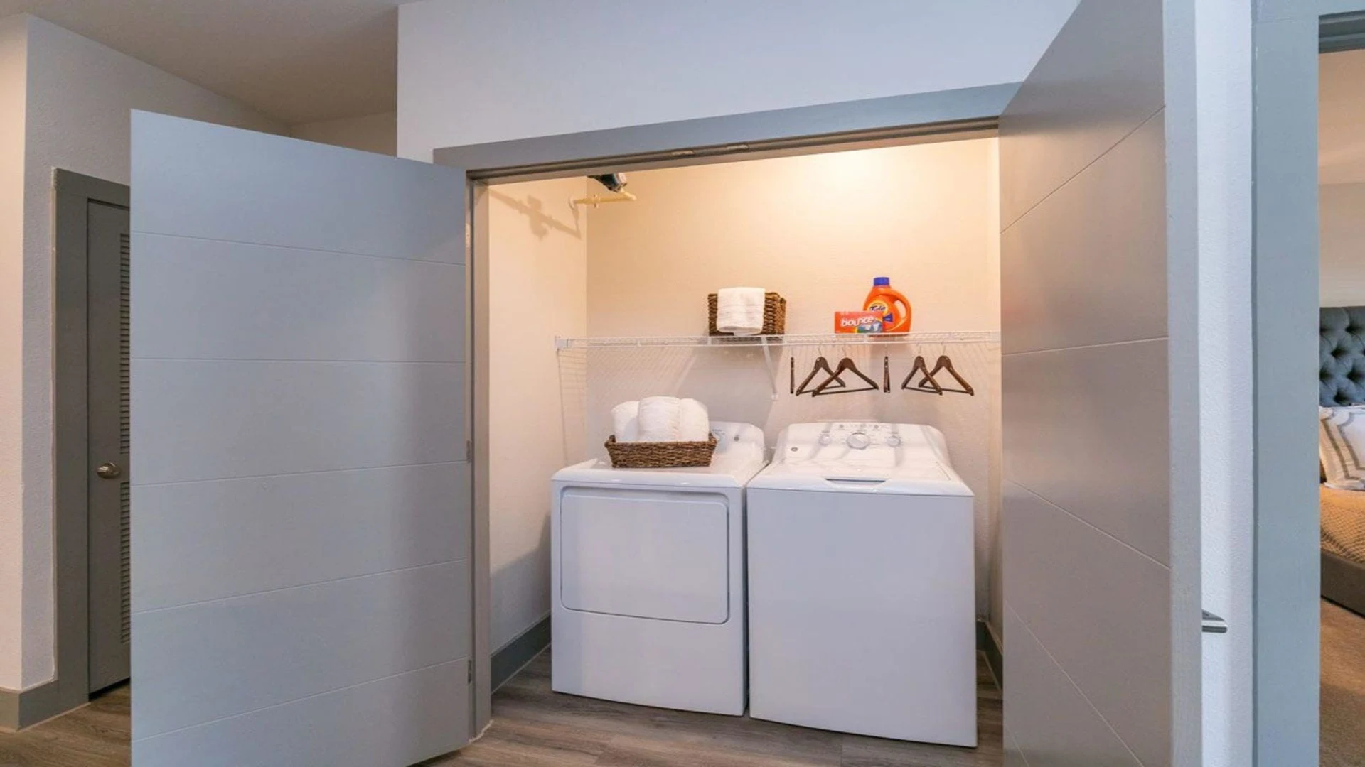 a laundry room with a washer and dryer in it at The Argon