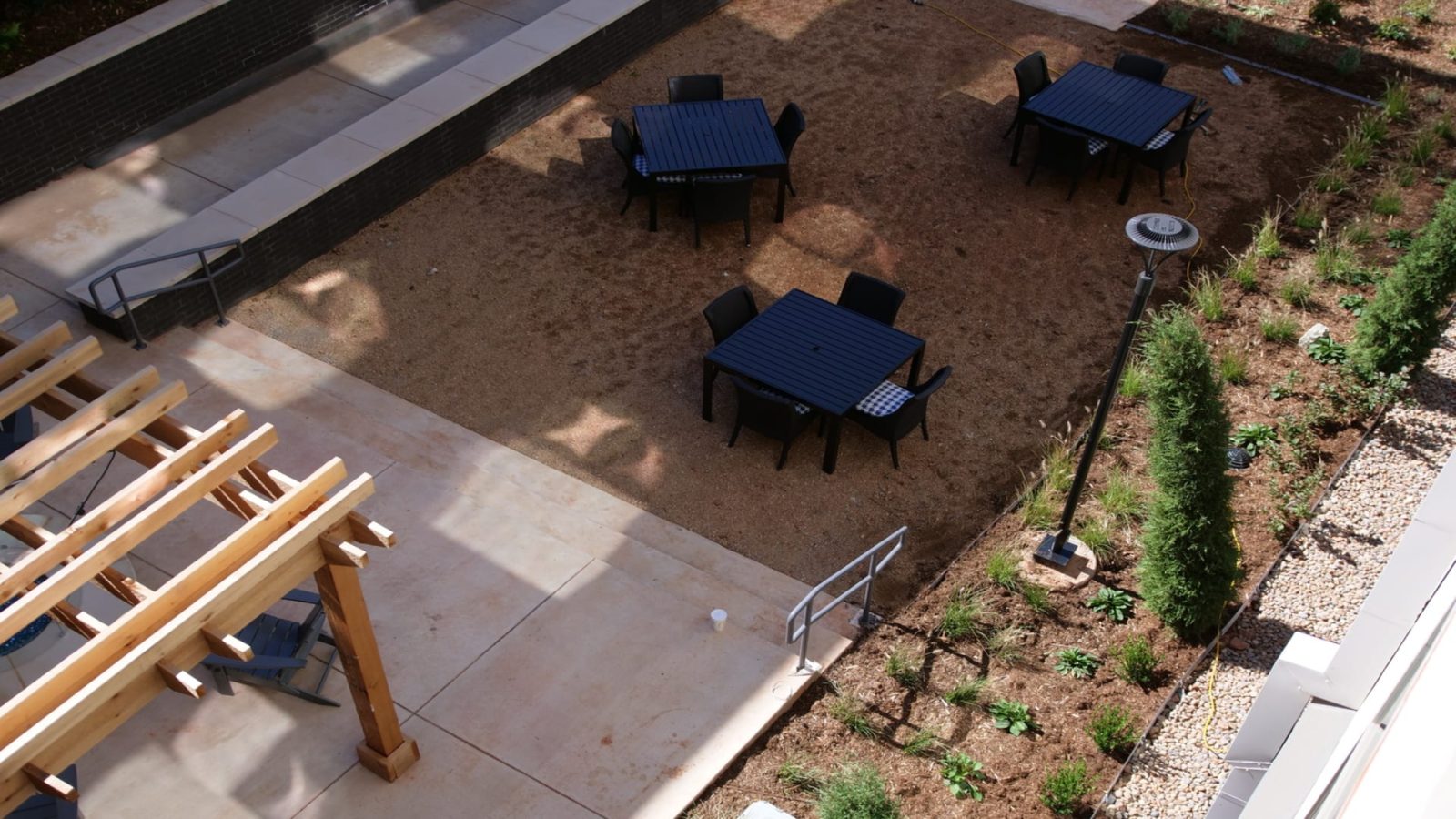 a view of a patio with tables and chairs at The Argon