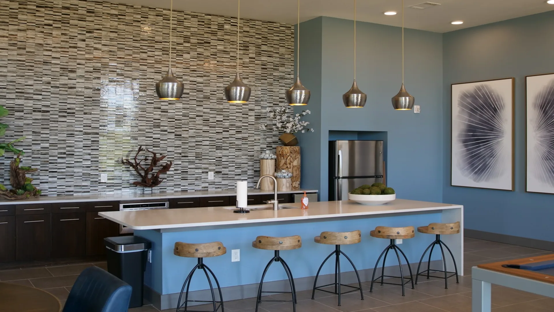 a kitchen with blue walls and blue counter tops at The Argon
